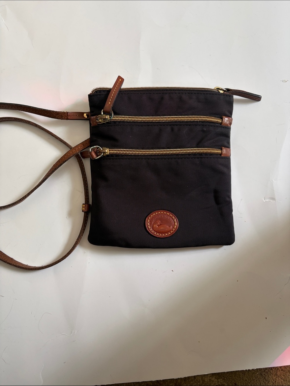 Dooney & Bourke Black Nylon Messenger with Brown Leather Trim